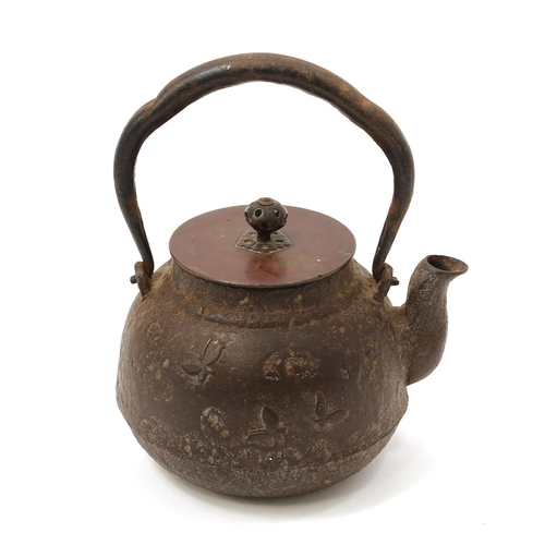 3118 - A Japanese cast iron tetsubin kettle, swing handle, the bronze cover signed to verso, 12.5cm long, M... 