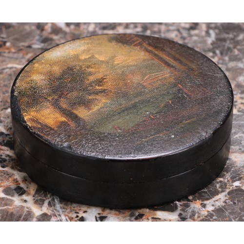 3125 - A late 18th century vernis martin and papier mache circular table snuff box, the puish-fitting cover... 