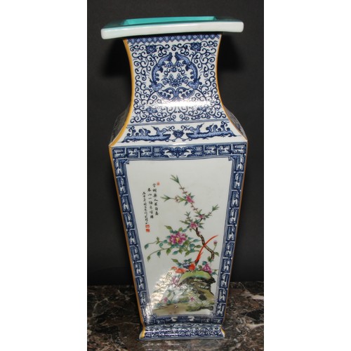 50 - A large Chinese tapered square vase, decorated in polychrome enamels with panels of fanciful birds a... 