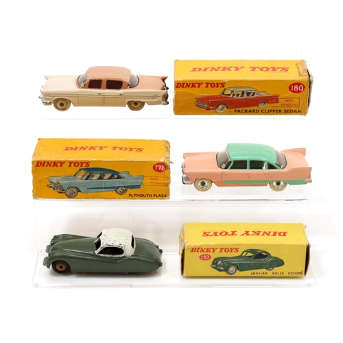 7241 - Dinky Toys 157 Jaguar XK120 coupé, drab green body, later painted white roof, tan ridged hubs, boxed... 