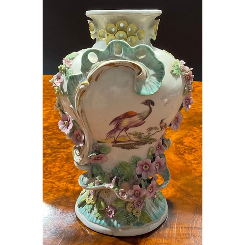 74 - A Derby Patch Mark Rococo style pedestal vase, painted in polychrome with fanciful birds, encrusted ... 