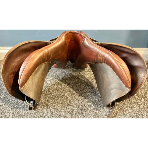 78 - Riding -  equestrian interest, a brown leather eventing saddle, 17