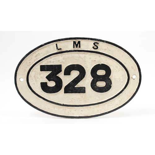 7273 - Railwayana - an LMS oval shaped painted cast iron bridge plate, raised black lettering on a white gr... 