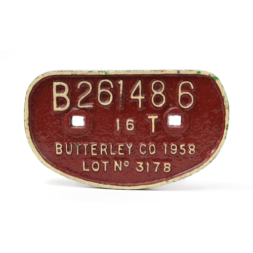 7276 - Railwayana - a 'D' shaped painted cast iron wagon plate, raised white lettering on a red/maroon grou... 