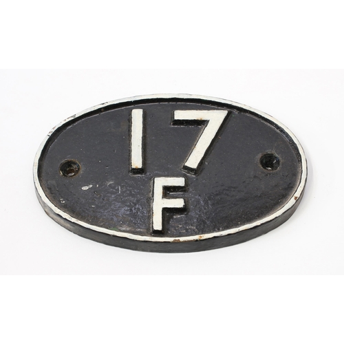 7290 - Railwayana - an oval shaped painted cast iron shed plate, raised white lettering on a black ground, ... 