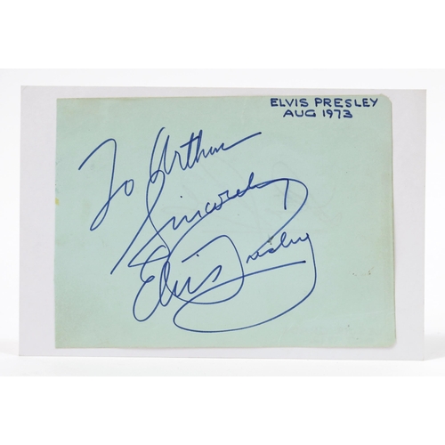 7314 - Autographs, Elvis Presley, The King - a signed page from an autograph album, pasted on rectangular s... 