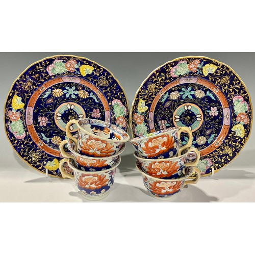 140 - Ceramics - a pair of Mason’s Ironstone Imari palette dessert plates; six Imari pattern tea cups (8)