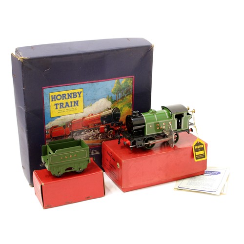 7265 - Hornby O Gauge tinplate, comprising No.101 0-4-0 tank locomotive (reversing), LNER green livery, No.... 