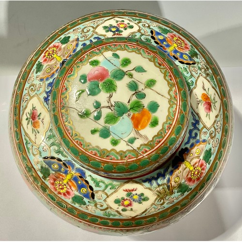 145 - Ceramics - a 19th century Chinese ginger jar and cover, painted in the famille verte palette, depict... 