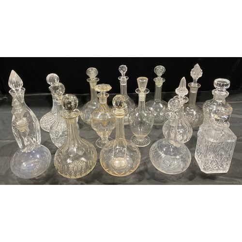 158 - Glassware - a collection of cut glass decanters, various shapes, some with associated stopper, early... 