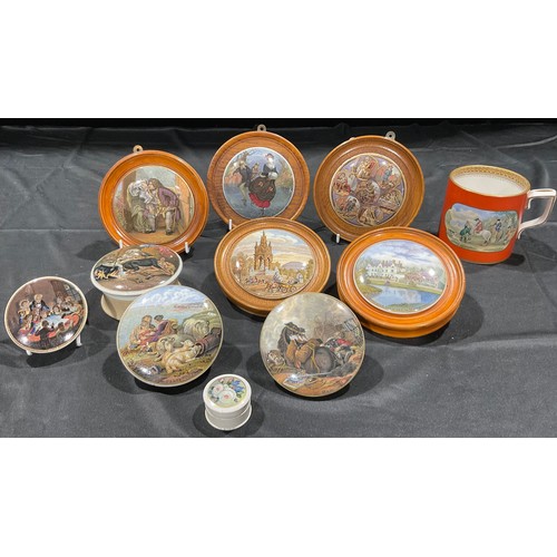 211 - A collection of Staffordshire Prattware pot lids, including Albert Memorial, War, Peace, Snap Dragon... 