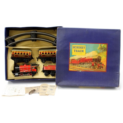 7266 - A Hornby O Gauge tinplate M1 passenger train set, comprising clockwork 0-4-0 tank locomotive and fou... 