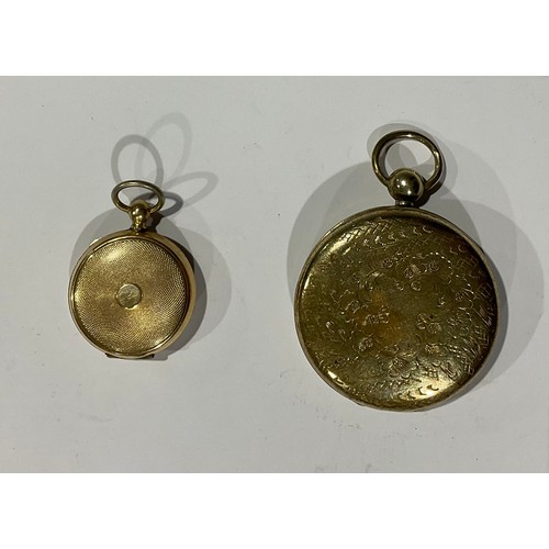 257 - A Victorian photograph locket; a mourning locket