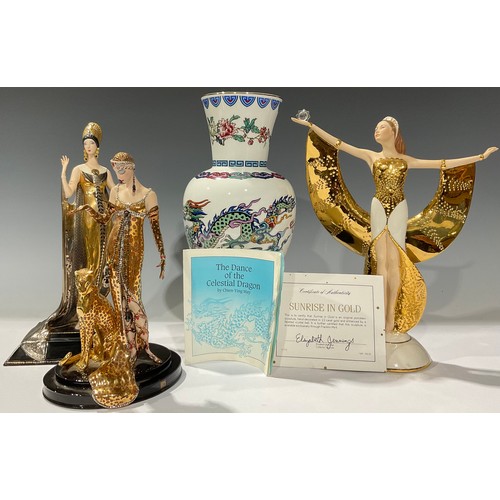 263 - A Franklin Mint porcelain figure, Sunrise in Gold, limited edition, 27.5cm high, with certificate; o... 