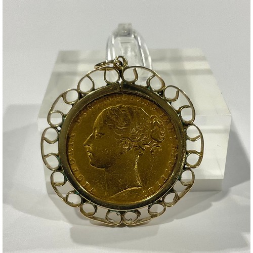 295 - A Victorian full gold sovereign, young head, 1880, 9ct gold openwork pendant mount, marked 375, 10.6... 