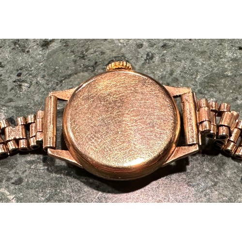 301 - A lady's Omega 9ct gold watch, Champagne dial, baton indicators, marked 375, integral 9ct gold fancy... 