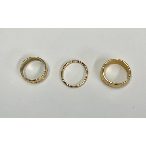 315 - An 18ct gold wedding band, marked 750, ring size M, 8.2g; two other 18ct gold wedding bands, 7.1g (3... 