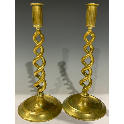 318 - A pair of Victorian brass open twist candlesticks, 30cm high, c.1900