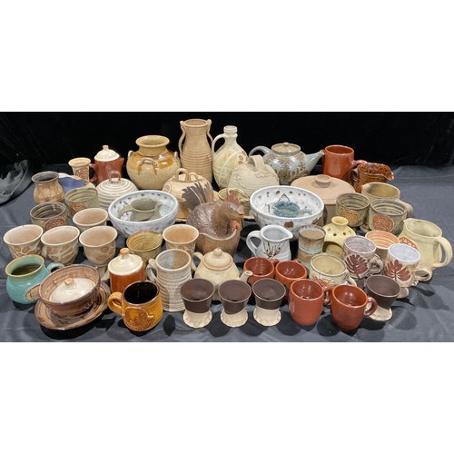 324 - Studio Pottery - a collection of 20th century studio pottery, including vases, tea and table ware, b... 