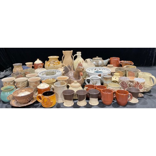 324 - Studio Pottery - a collection of 20th century studio pottery, including vases, tea and table ware, b... 