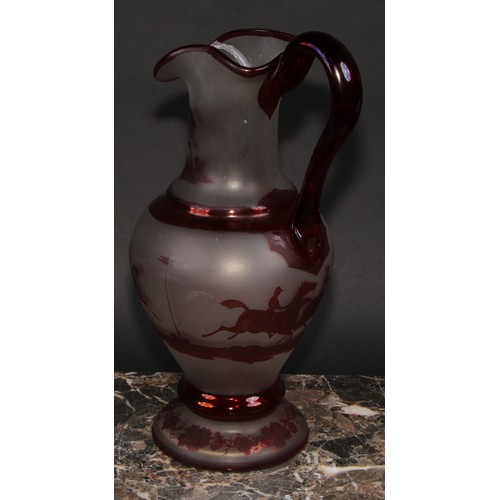 403 - A 19th century bohemian glass ewer, decorated with scenes of horse racing, 30cm high, c.1880