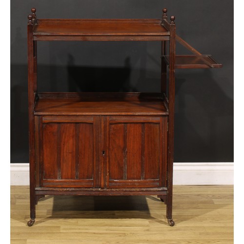 89 - A late Victorian/Edwardian walnut buffet serving cabinet, rectangular plateau above a pair of doors,... 