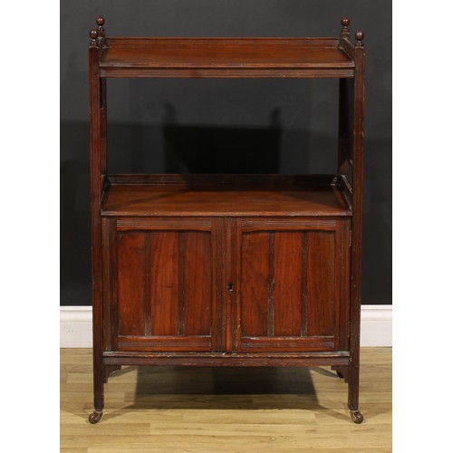 89 - A late Victorian/Edwardian walnut buffet serving cabinet, rectangular plateau above a pair of doors,... 