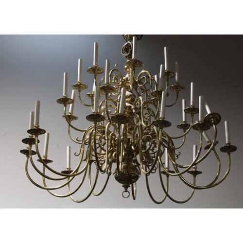 92 - A substantial contemporary 17th century Dutch style thirty-two light brass electrolier, 130cm high, ... 