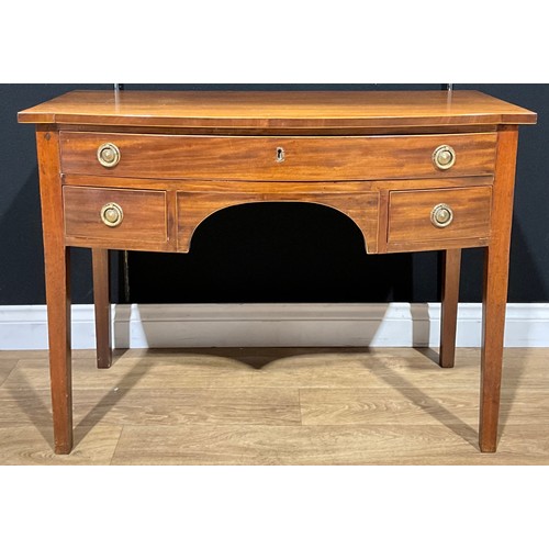 187 - A 19th century mahogany bow front desk, 71cm high, 96cm wide, 49cm deep