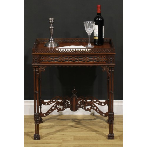 192 - A Chippendale Revival mahogany fretwork and blind fretwork silver table, galleried rectangular top, ... 