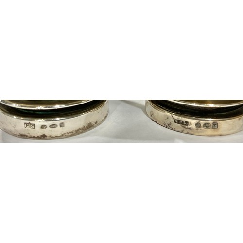 433 - A near pair of Danish silver spherical salt and pepper pots, 4.5cm high, marked 925, London import m... 