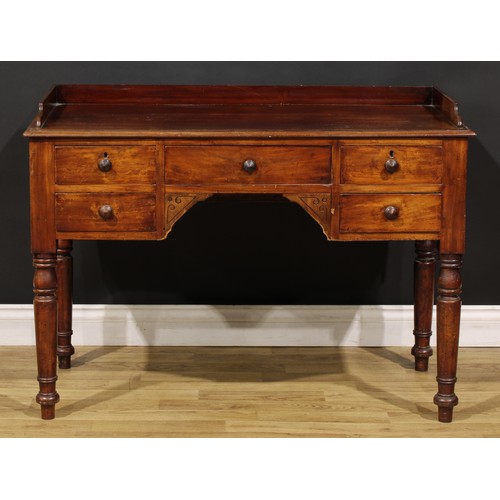 461 - A Victorian mahogany kneehole chamber table, rectangular top with shallow three-quarter gallery abov... 