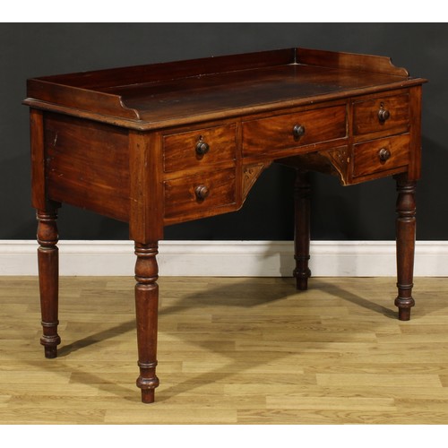 461 - A Victorian mahogany kneehole chamber table, rectangular top with shallow three-quarter gallery abov... 