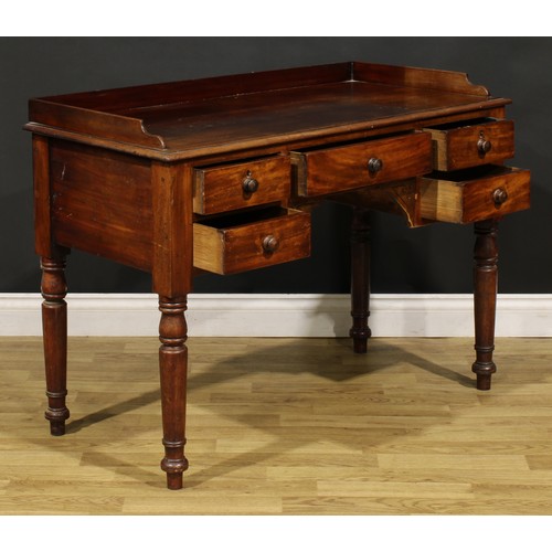 461 - A Victorian mahogany kneehole chamber table, rectangular top with shallow three-quarter gallery abov... 