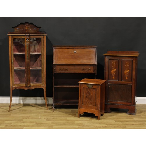 462 - An Edwardian display cabinet, 141cm high, 61cm wide, 35cm deep; an early 20th century music room cab... 