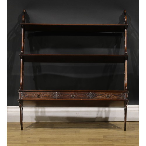 465 - A Chippendale style mahogany waterfall wall shelf, cockpen style ends, 90cm high, 77cm wide, 22cm de... 