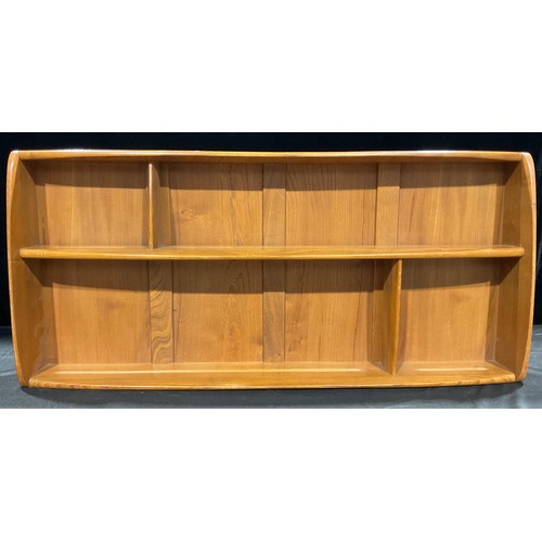 467 - An Ercol modernist wall shelf