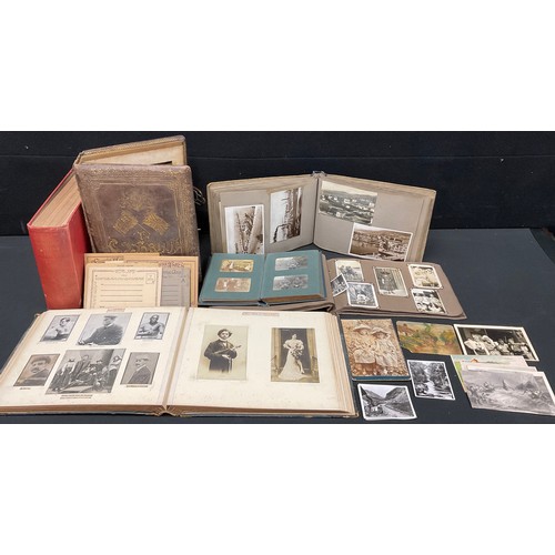 447 - A 19th century musical photograph album, The Victorian Album, containing topographical and other pho... 