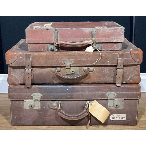 492 - Vintage Luggage - three leather suitcases, one with GWR railway label