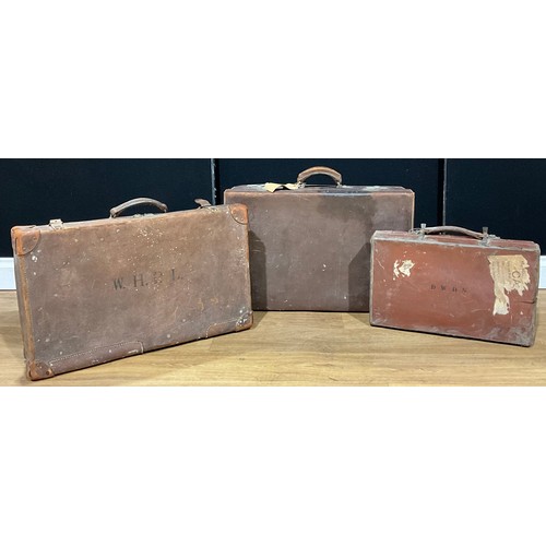 492 - Vintage Luggage - three leather suitcases, one with GWR railway label