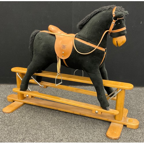 64 - A contemporary rocking horse, 86cm high x 121.5cm long.