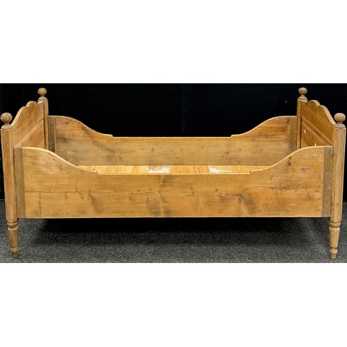 66 - A Victorian pitch pine, and pine, narrow single bed, 84cm high x 187.5cm long x 80cm wide.