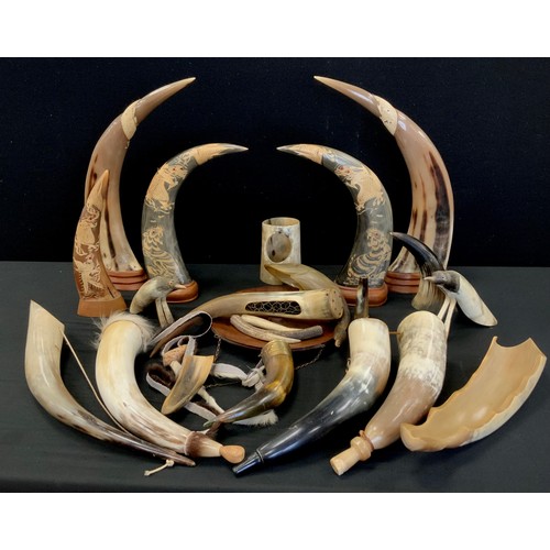 85 - Horns- two pairs of carved bovine horns, with Dragons, Tigers and Mythical Beasts,  powder flask hor... 