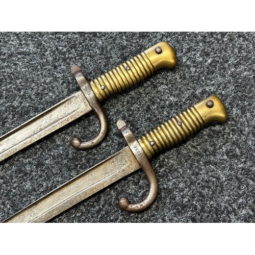 9064 - Pair of French 1866 Pattern Chassepot bayonets. One dated 1874, the other is unmarked. Both have wor... 