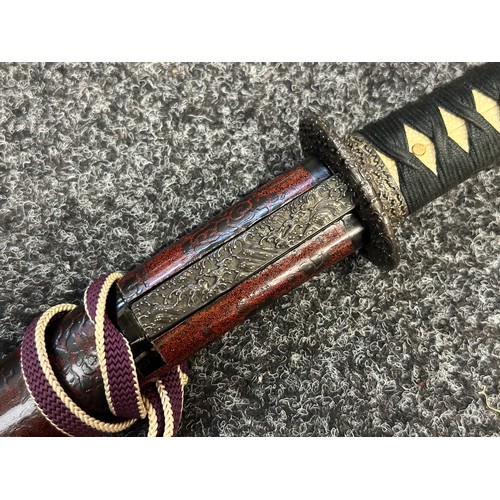 9066 - Japanese Wakizashi Sword with single edged blade 445mm in length. Good Hamon line. Signed tang. Over... 