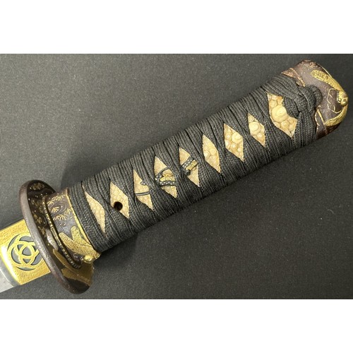 9067 - Japanese Wakizashi Sword with single edge blade with good Hamon line 400mm in length. Mon to the Hab... 