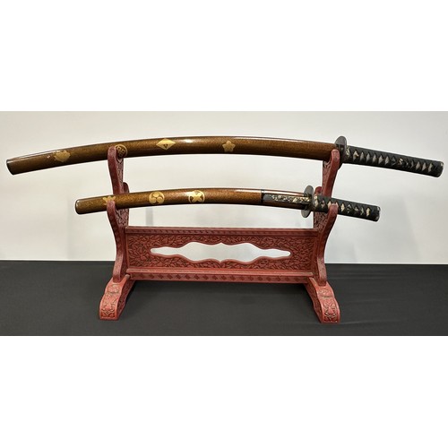 9070 - Japanese Pair Daisho Swords with complete with display stand and cloth protective bags. Larger Katan... 