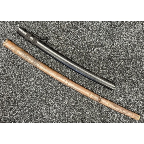 9073 - Two Japanese Sword Scabbards. Modern example in black wood with 