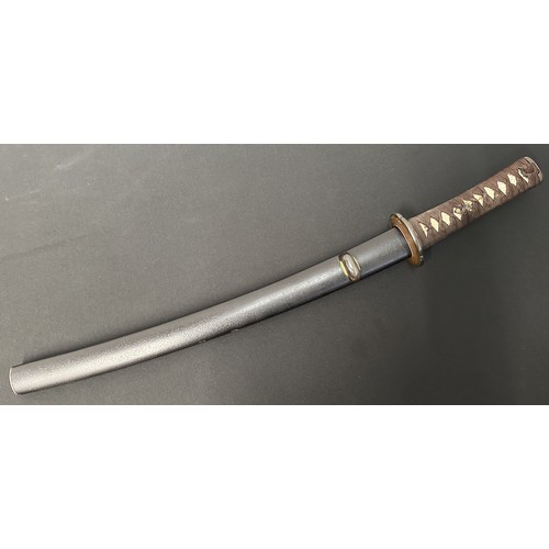 9074 - Japanese Wakizashi Sword with single edged double fullered blade 440mm in length. Hamon line to edge... 