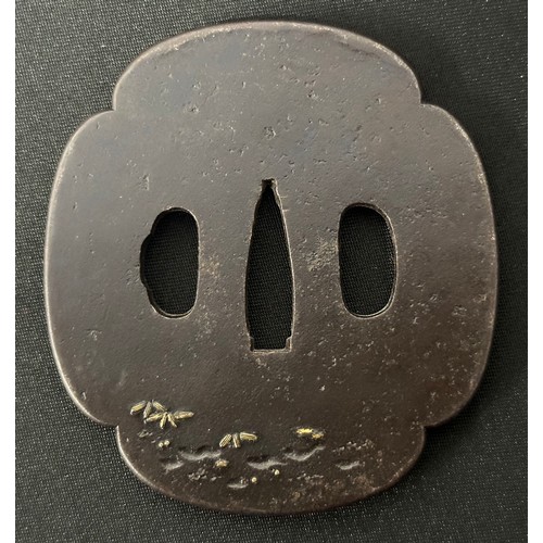 9089 - Japanese Sword Tsuba in bronze, unsigned, featuring two Dogs. Size 84mm x 77mm.